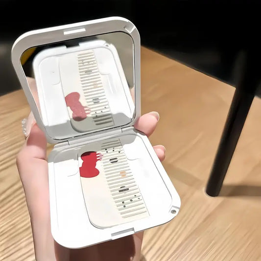 Cutie cu oglindă pliabilă și pieptene